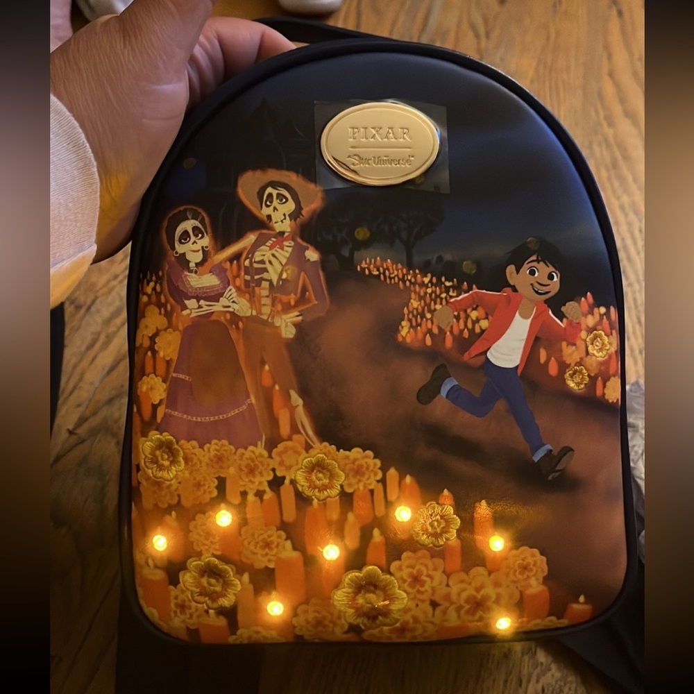 Pixar our universe coco Miguel cemetery light up backpack